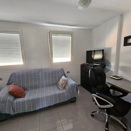 Quarto em Acomodações Particulares Habitación Roque Del Conde