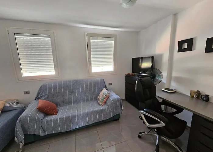 Quarto em Acomodações Particulares Habitación Roque Del Conde